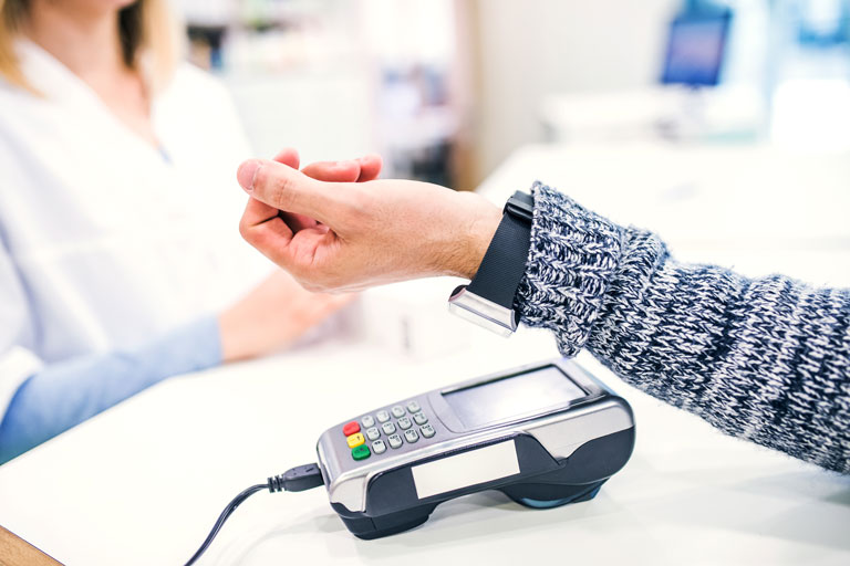 Customer paying with a smartwatch